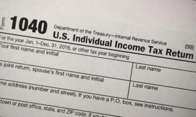 Top of an IRS Form 1040: Department of the Treasury, U.S. Individual Income Tax Return title and year fields visible.