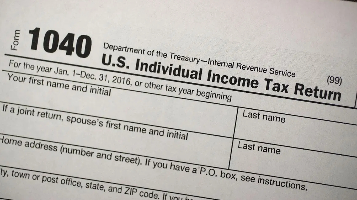 Top of an IRS Form 1040: Department of the Treasury, U.S. Individual Income Tax Return title and year fields visible.