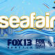 Seafair promotional graphic with Seattle skyline, blue waves, and aircrafts, FOX 13 Seattle logo included.
