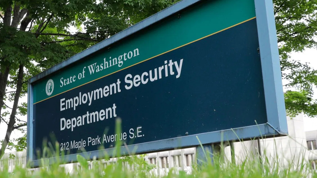 Sign for the State of Washington Employment Security Department, 212 Maple Park Avenue SE, outdoors in a grassy area with trees in the background.