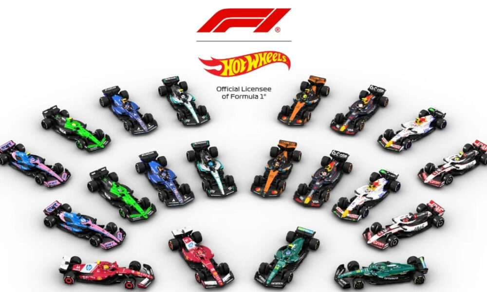 Array of colorful Formula 1 cars arranged in a circle around the Formula 1 and Hot Wheels logos.