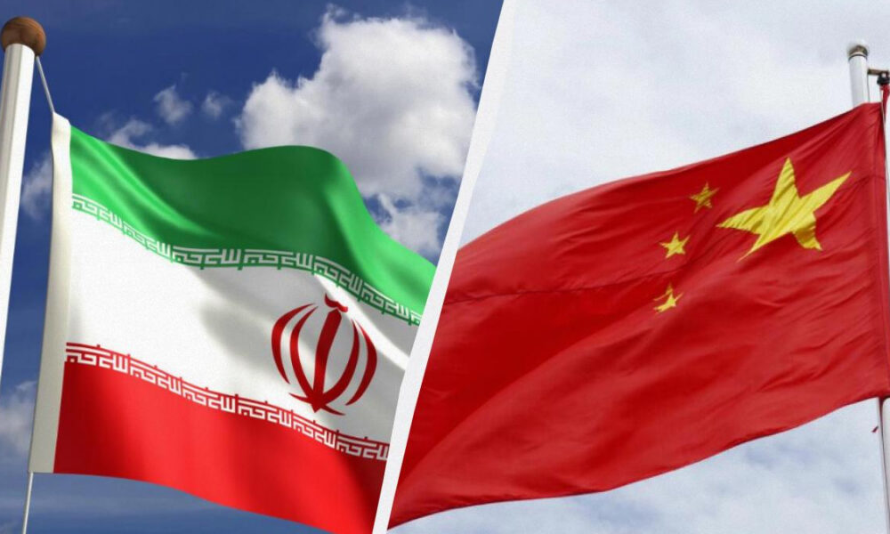 Split image with the Iranian flag on the left and the Chinese flag on the right, both waving in the wind on flagpoles.