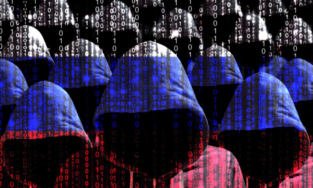 Hooded figures in blue and red tones with streams of binary code, symbolizing cyber hacking and data security threats.