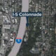 Aerial map showing I-5 Colonnade label along a highway beside a marina and buildings in a coastal city.