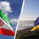 Iranian flag waving on the left with green‑white‑red stripes and red emblem, against a blue sky; Ukrainian flag waving on the right over a river and hillside landscape with a bridge, split by a diagonal divider.