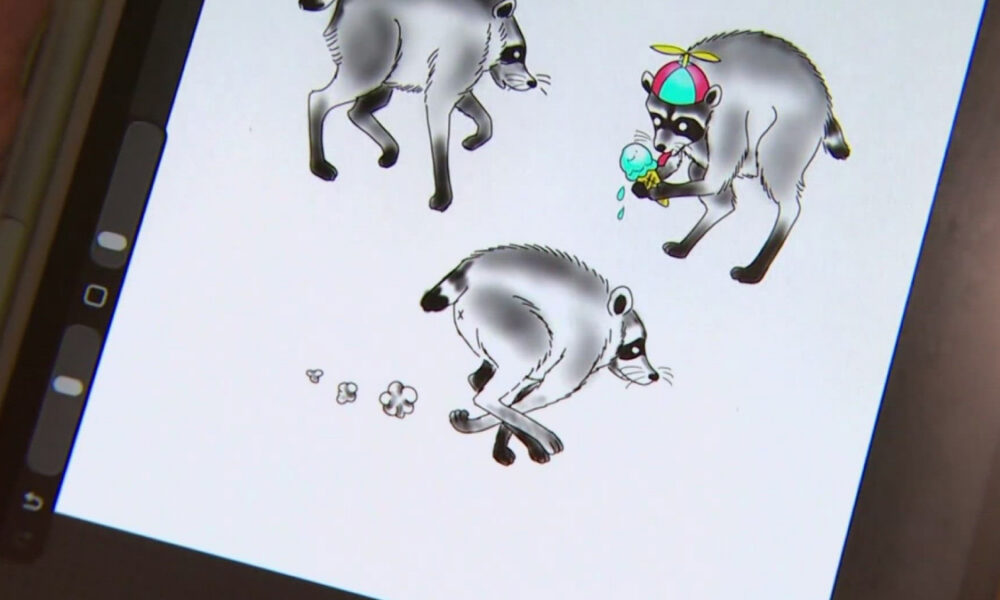 Three gray cartoon raccoons on a white page; one wears a colorful propeller hat and eats ice cream while a second stands nearby and a third crouches playfully.