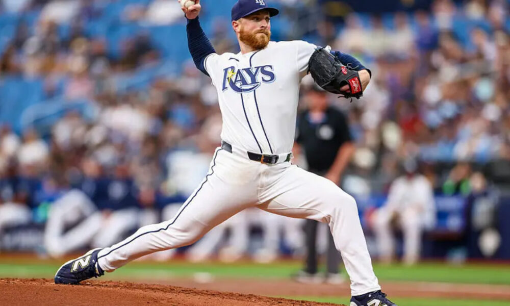 Tampa Bay Rays pitcher delivering a pitch on the mound during a game.