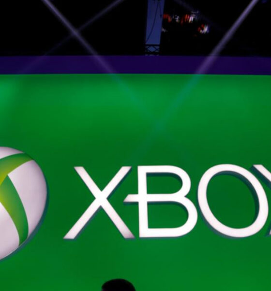 Xbox brand logo on a bright green backdrop, with a white and green spherical emblem adjacent to the word 'XBOX'