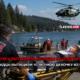Paramedics and firefighters transport a girl on a stretcher from the lakefront as a rescue helicopter hovers overhead; a news banner spans the foreground.