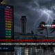 Airport departure board shows many CANCELED and DELAYED flights at night, with a stormy sky and a parked jet in the background; news overlay in Russian.