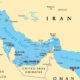 Middle East map highlighting Iran and Gulf states with capitals: Kuwait City, Doha, Abu Dhabi, Muscat, Riyadh.