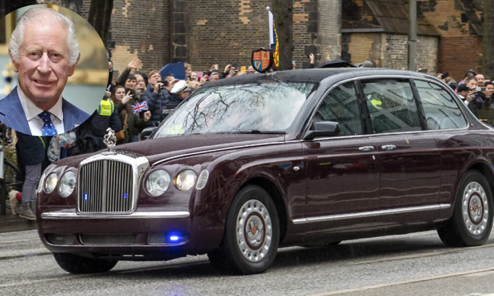 Maroon luxury sedan driving past a crowd of spectators on a city street; circular inset shows a man in a blue suit portrait.