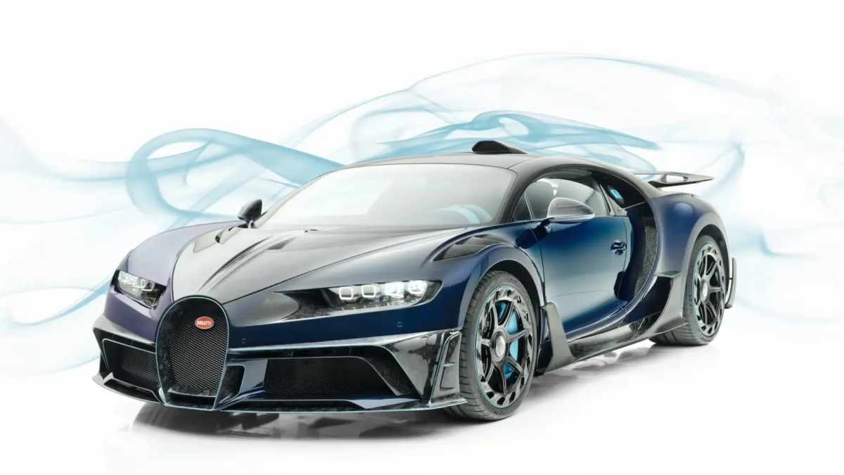 Front three-quarter view of a dark blue Bugatti sports car with butterfly doors open against a white studio backdrop.