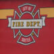 Seattle Fire Department emblem on a red fire truck door.