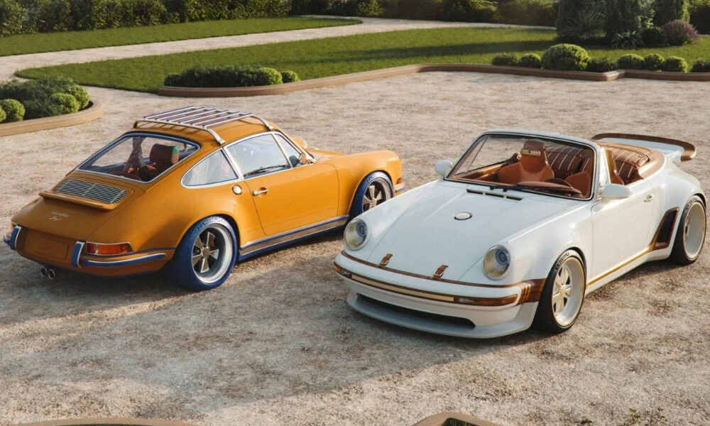 Two vintage Porsche convertibles parked on a gravel driveway with neatly trimmed shrubs in the background.