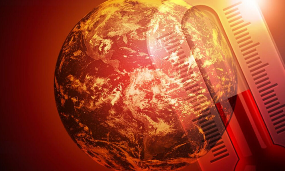 Globally warming theme: Earth with a large thermometer overlay signaling rising temperatures.