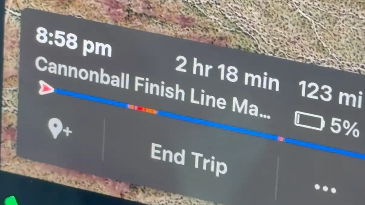 Navigation card showing trip progress: time, duration, distance, and a progress bar with End Trip option.